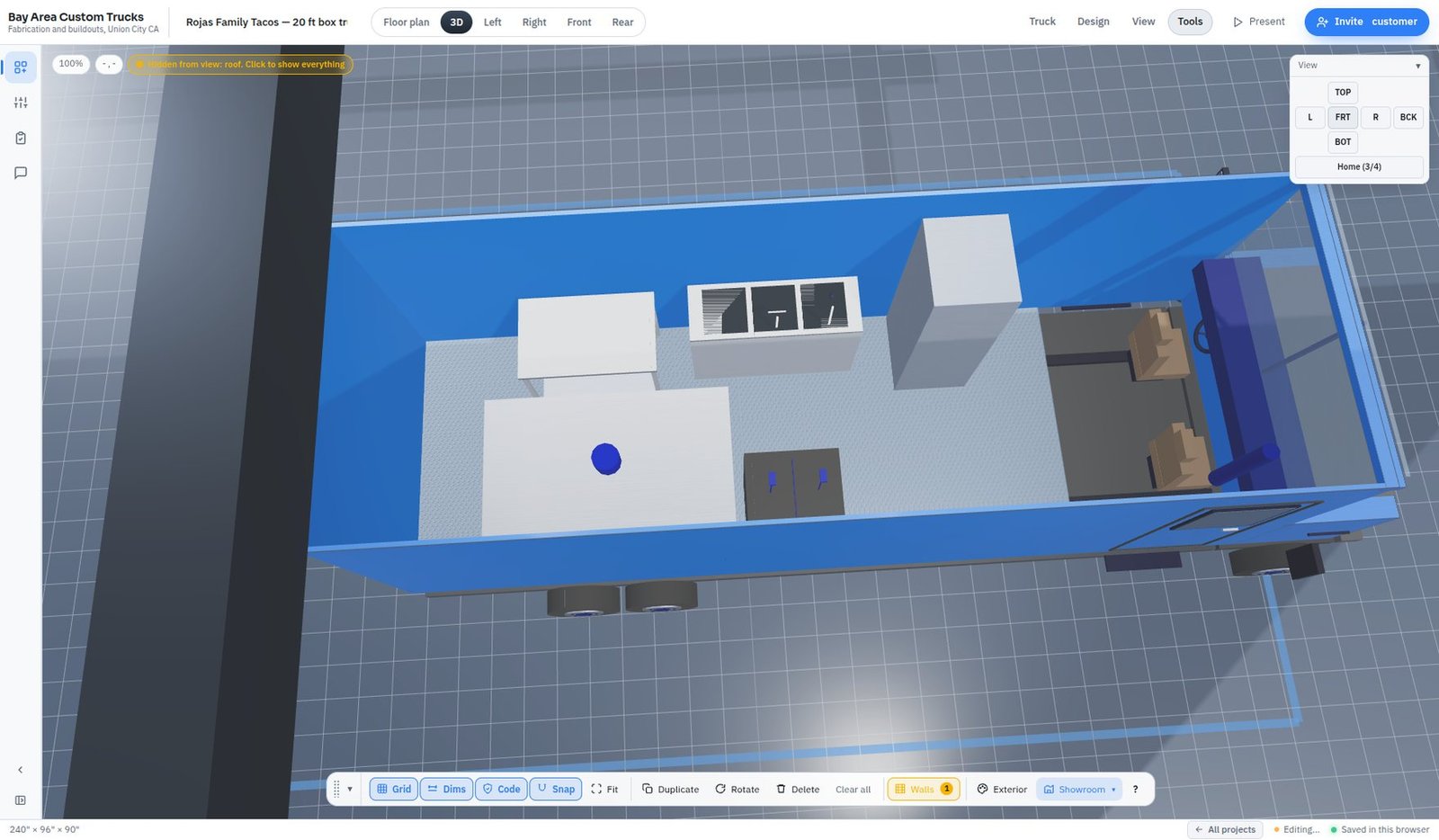 Top-down 3D view inside the box truck with the roof hidden, showing the cook line under the hood and the prep side